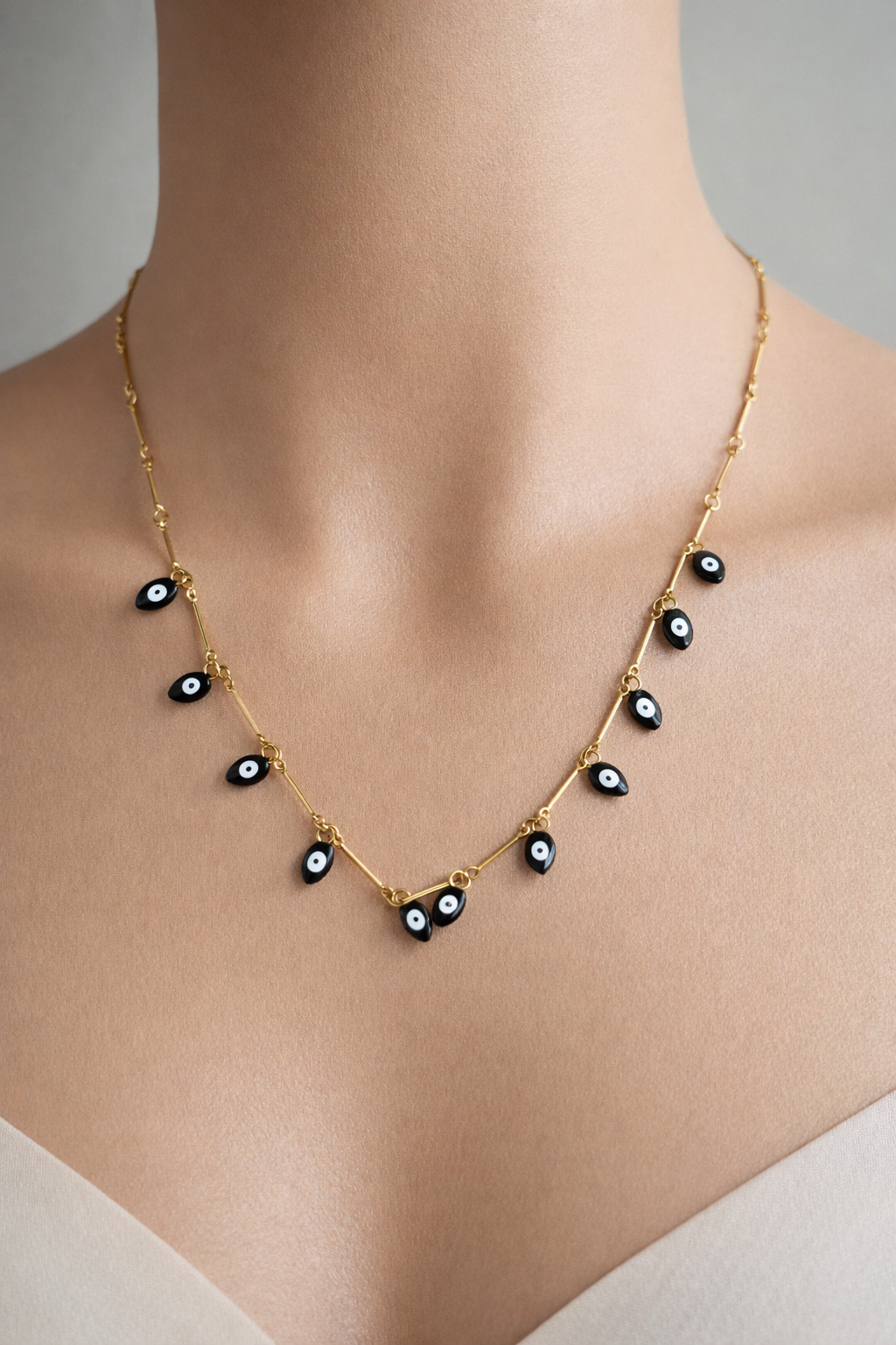 Collier "œil" Mobelle
